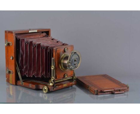 A mahogany and brass Lancaster 'The 1895 Instantograph Patent' Half-Plate Field Camera,  with Lancaster Patent lens and rotar