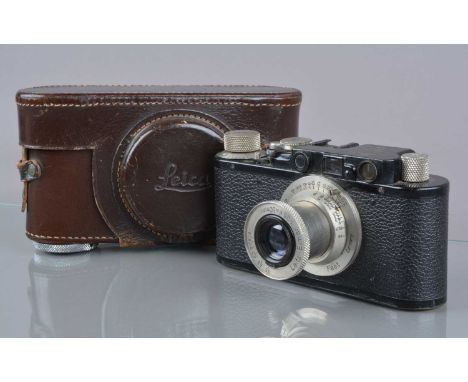 A Leitz Wetzlar Leica II Rangefinder Camera, serial no 115858, 1934, serial number refers to chrome version, camera brass/bla