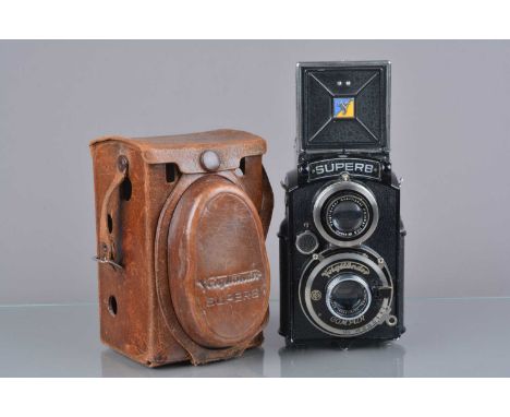 A Voigtländer Superb TLR Camera, late version, with sports finder, 1934, shutter working, body G, some paint wear to edges, l