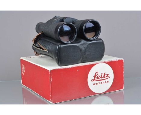 A Pair of Leitz Wetzlar 7x42B 140m/1000m Trinovid Binoculars, serial no 754953, body G, some ageing to eye cups, some paint p
