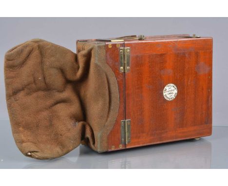 An early 20th Century Mahogany Brass and Suede Leather 'The "Pullman" Changing Box', with brass indicator and 0-12 scale, G