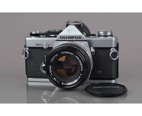 An Olympus OM-2n MD SLR Camera, chrome, serial no 1095953, shutter working, meter responsive, self-timer working, body G-VG, 