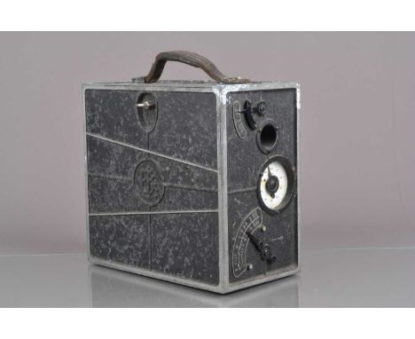 A Cine Kodak Model A 16mm Cine camera, serial no 19235, hand crank moves freely, body P-F, paint flaking, some surface oxidis