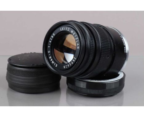 A Leitz Wetzlar 90mm f4 Elmar-C  Lens, serial no 2572428, 1973, barrel G-VG, elements F, fungus, with front/rear caps and len