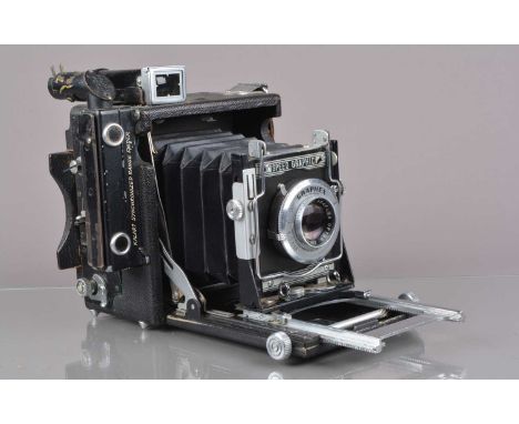 A Graflex Miniature Speed Graphic Press Camera,  serial no E83393, focal plane shutter working, rangefinder functions, body F