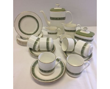 Comprising: teapot, milk jug, cream jug, sugar pot, 6 cups & saucers, 6 teaplates & a sugar bowl. 