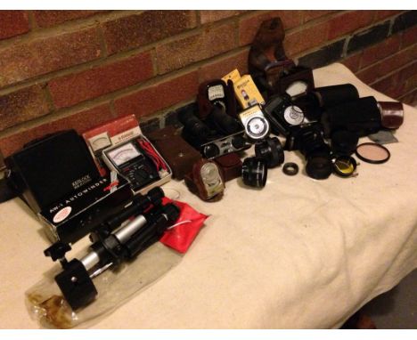 To include: Slitz tripod (compact), Micronta 8 Range Multimeter, Kenlock beacon, Various light metres, various lenses. 