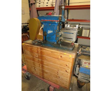 AN ATLAS METALWORKING SHAPER ON WOODEN CABINET 240V