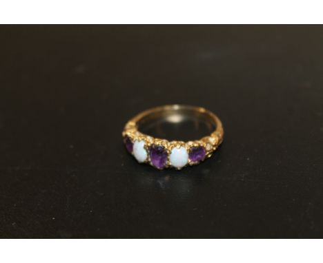 A HALLMARKED 9CT GOLD FIVE STONE AMETHYST AND OPAL RING - APPROX WEIGHT 3.1 G 