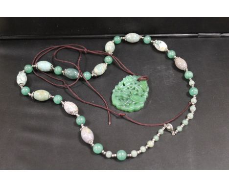 A JADE STYLE PENDANT TOGETHER WITH A POLISHED HARDSTONE NECKLACE