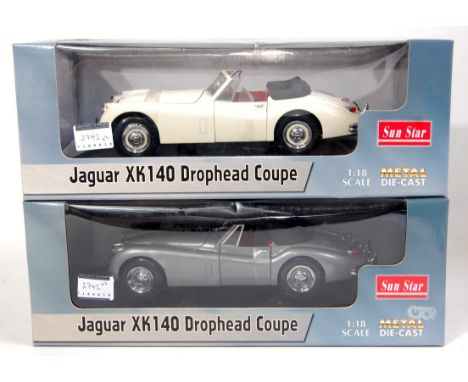 A Sunstar 1/18 scale boxed diecast group to include 2x Jaguar XK140 drophead coupe, one finished in silver, the other in crea