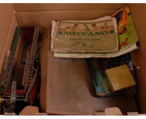 A large quantity of mixed vintage Meccano to include red and green and base metal components, some pieces rusty