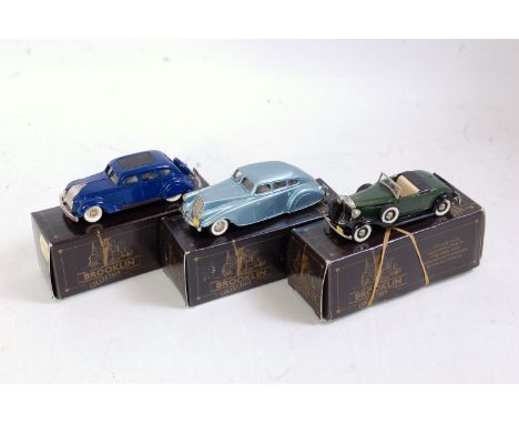 A Brooklin 1.43 scale white metal diecast group to include a DRK7 1934 Chrysler Air Flow, a BRK No. 1 1933 Pearce Arrow Silve