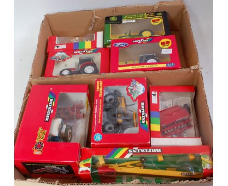 Eight various boxed Britains 1/32 scale farming implement and tractor diecast group, to include; Ford 7000 and cultivator set