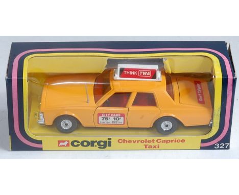 Corgi Toys, 327, Chevrolet Caprice Taxi, comprising yellow body, red interior, with Think TWA Livery, in the original window 