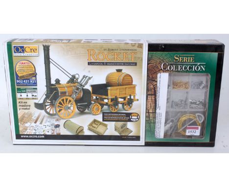 An Oc-Cre 1/24 scale wooden photo etched and white metal kit for a Stephenson's Rocket, appears as issued