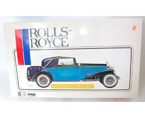 A Pocher 1/8 scale white metal and plastic kit for Rolls Royce Phantom 2 Sedonka coupe 1932, appears as issued in original bo