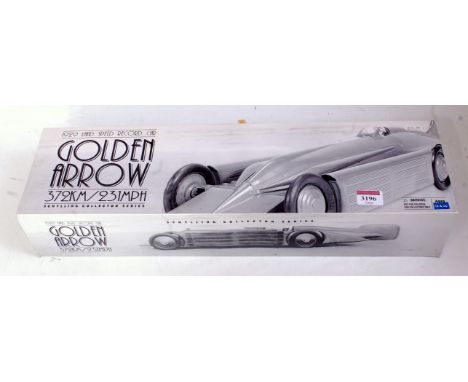 A Schylling Collectors Series tinplate and clockwork model of a 1929 Golden Arrow landspeed record car, in original all-card 