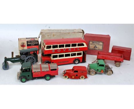 A collection of mixed pre- and post- war Triang Minic tinplate vehicles and empty boxes, to include double decker bus, steam 