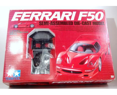 A Tamiya 1/12 scale semi-assembled diecast model of a Ferrari F50, in original polystyrene packed window box, model finished 