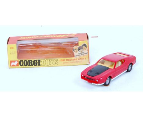 A Corgi Toys No. 391 Ford Mustang Mack 1 as featured in James Bond 007 film Diamonds are Forever, comprising of red body with