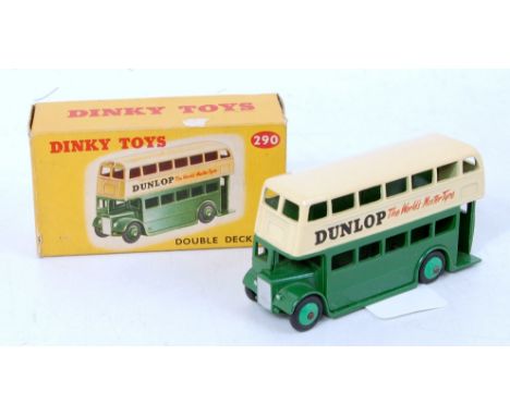 A Dinky Toys No. 290 double decker bus comprising of cream and green body with mid green hubs and Dunlop livery in the origin