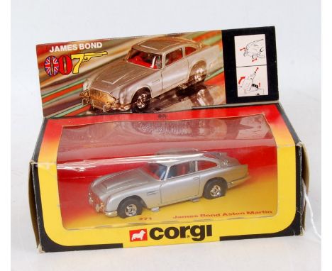 A Corgi Toys No. 271 James Bond Aston Martin DB5 comprising of silver body with red interior and single bandit figure in the 