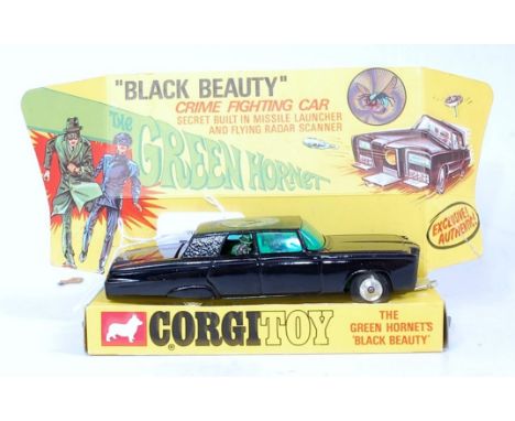 A Corgi Toys No. 268 The Green Hornets Black Beauty comprising black body with green glazing and spun hubs in the original sl