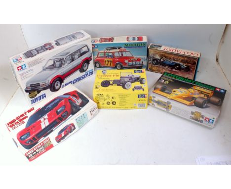 Twelve various boxed plastic and white metal mixed scale car kits, to include Tamiya, Solido, Revel etc, a Lotus 99T Honda, a