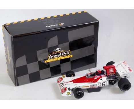 An Exoto Grand Prix Classics 1/18 scale model of a Tyrrell Ford 003 Lucky Strike racing car, appears as issued in the origina