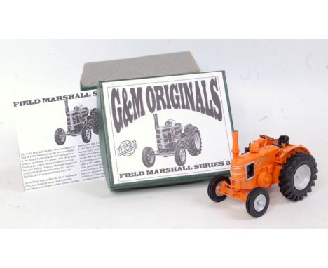 A G&M Originals 1/32 scale white metal and resin model of a Field Marshall series 3 tractor, finished in orange, in the origi