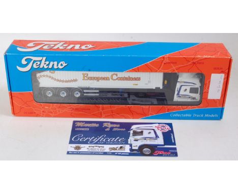 A Tekno 1/50 scale limited edition model of a Daf 460 Superspace Cab, with three axle 40' container load, finished in Martin 