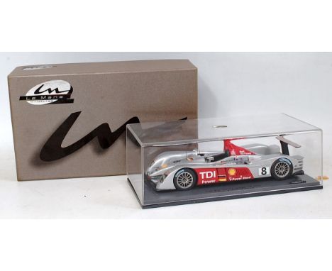 A Le Mans Miniatures by Minimax 1/24 scale diecast model of an Audi R10 TDI Le Mans 2006 winner, finished in silver and red w