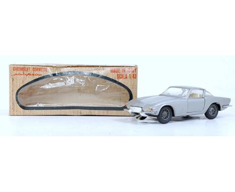 A Mebe Toys made in Italy 1/43 scale of an A-22 Chevrolet Corvette Coupe Rondine comprising silver body with off-white interi