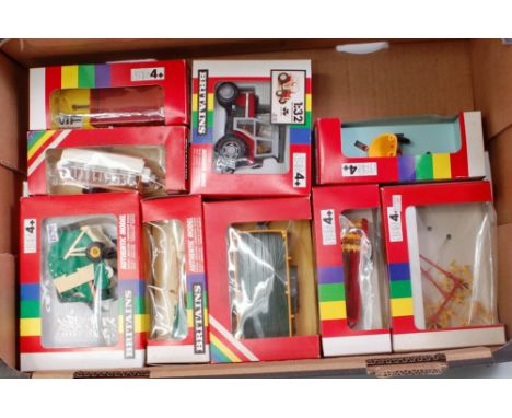 Nine various boxed Britains farming implements and tractor diecast models, to include; No.9502 Massey Ferguson MF362 tractor,