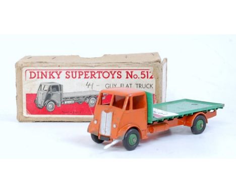 A Dinky Toys boxed commercial vehicle diecast group to include No. 511 Guy 4 ton lorry comprising  violet blue cab and chassi