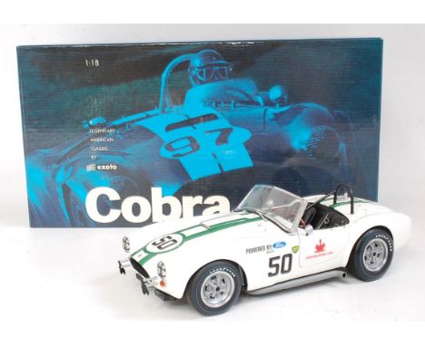 An Exoto Racing Legends 1/18 scale model of a Cobra 289 racing car, finished in white and green with racing No.50, in origina