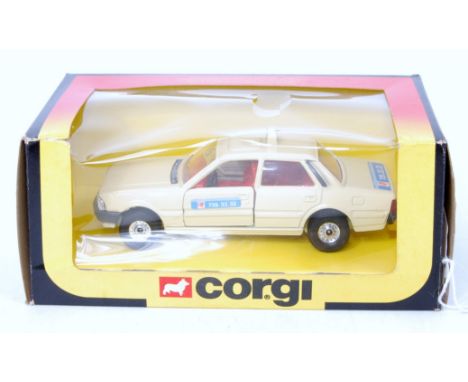 A Corgi Toys No. C450 Peugeot 505 taxi with G7 radio stickers to doors and boot, in the original window box, appears as issue