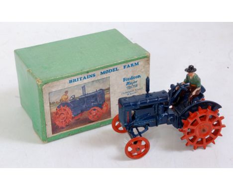 A Britains Farm Series No. 127F Fordson Major tractor with spudded metal wheels comprising blue body with orange wheels and o