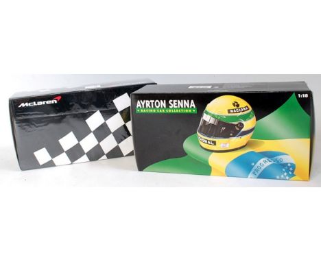 A Minichamps 1/18 scale boxed F1 diecast group, two examples to include Ayrton Senna racing car collection, Lotus Renault 97T