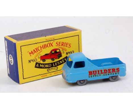 A Matchbox 1/75 series No. 60 Morris J2 pickup comprising light blue body with grey plastic wheels and rear  window cut-out i