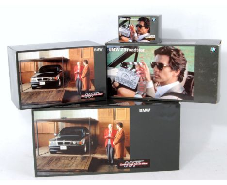 Four various boxed UT Models James Bond 007 diecasts to include 1/18 scale BMW Z3 roadster, together with a Tomorrow Never Di