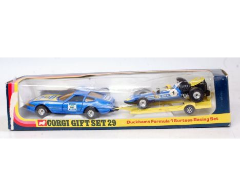 A Corgi Toys gift set No.29 Duckham's Formula 1 Surtees racing set, appears as issued in the original window box with polysty