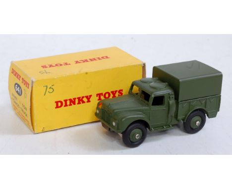 A Dinky Toys No. 641 Army 1 ton Cargo truck comprising military green body and hubs in the original all-card box (NM-M,BVG)