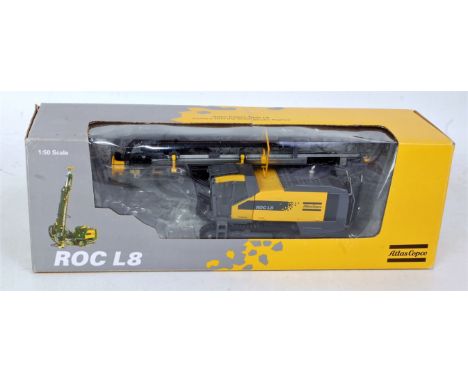 An Atlas Copco 1/50 scale model of an ROCL8 surface drilling farm mining unit, in the original window box