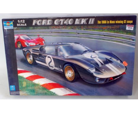 A Trumpeter 1/12 scale plastic kit for a Ford GT MkII 1966 Le Mans winner car, appears as issued, in original all-card box Co