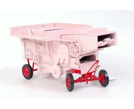 A G&M Originals 1/32 scale white metal and resin model of a Marshalls threshing machine, finished in pink and red and numbere