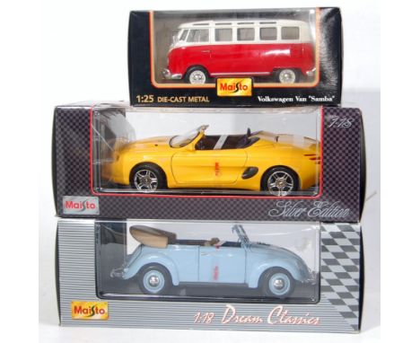 Seven various boxed Maisto 1/24 and 1/18 scale diecast vehicles to include a Volkswagen Samba van, a Volkswagen New Beetle, a