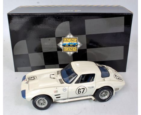 An Exoto Racing Legends 1/18 scale model of a Corvette Grand Sport, finished in cream and blue with racing number 67, in orig