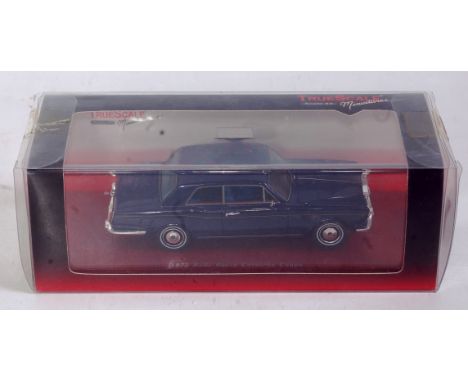TSM True Scale Miniatures, TSM 114316, 1/43rd scale resin model of a 1972 Rolls Royce Corniche Coupe, finished in dark blue, 